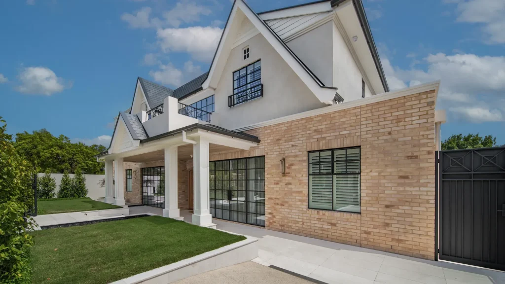 hamlyn custom luxury home brick and white exterior
