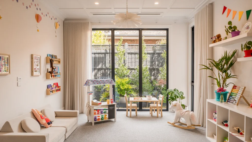 white gable luxury playroom with garden access