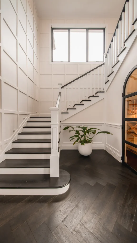 white gable luxury staircase modern custom home entry