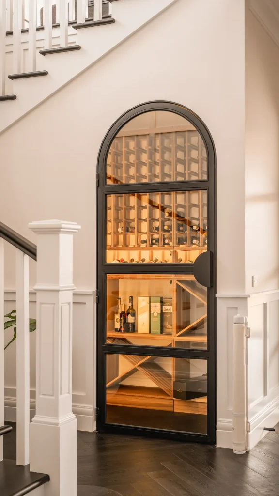 white gable luxury wine cellar arch door
