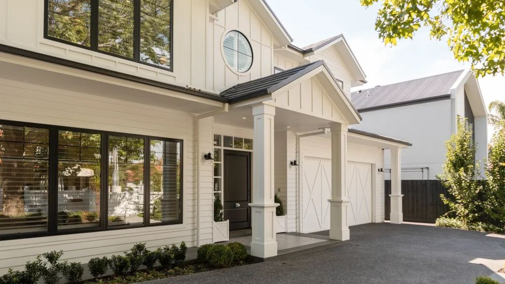 white gable modern luxury farmhouse with black trim